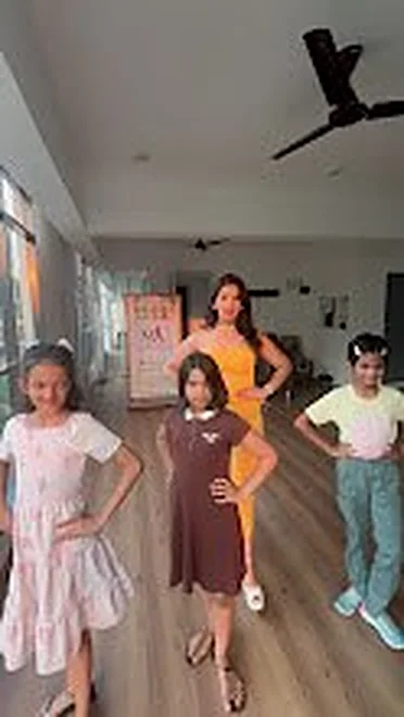Children posing during a birthday celebration at the studio