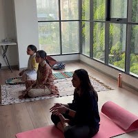 Meditation class on mats near the window, Baner, Pune